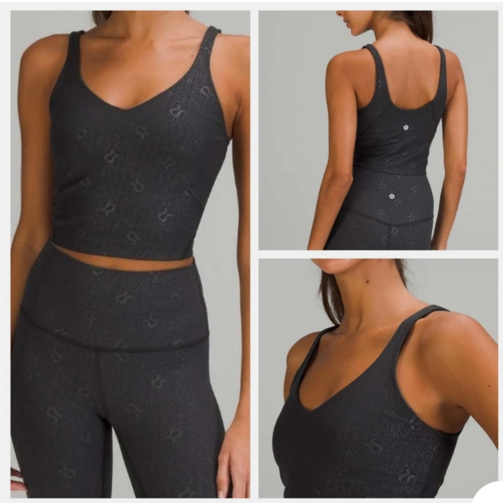 Size 8 Lululemon black align tank with logos on it